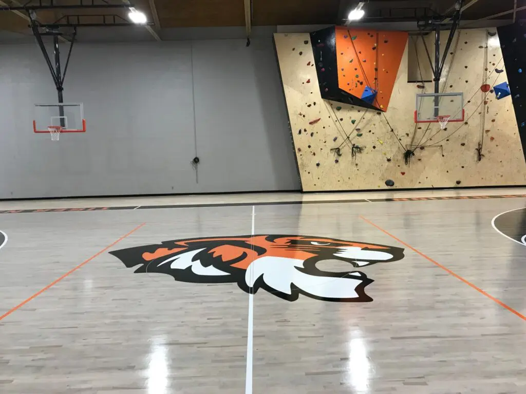 Painted tiger logo at center court on a finished maple floor