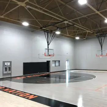 Indoor basketball court with hoops