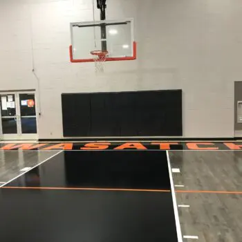 Basketball court with hardwood flooring