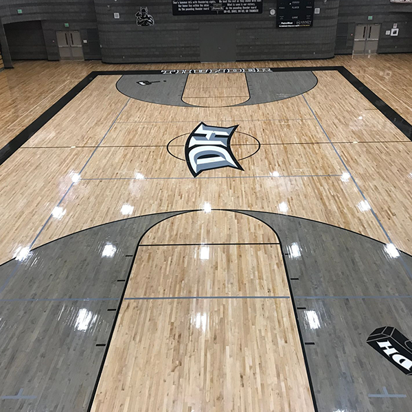 Basketball court with hardwood flooring
